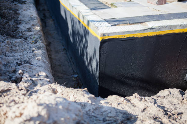 Professional Waterproofing technician working in Stilesville, IN